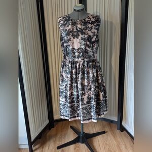 Vintage 00's, light pink w/ black design (like lace), shiny, sleeveless dress.